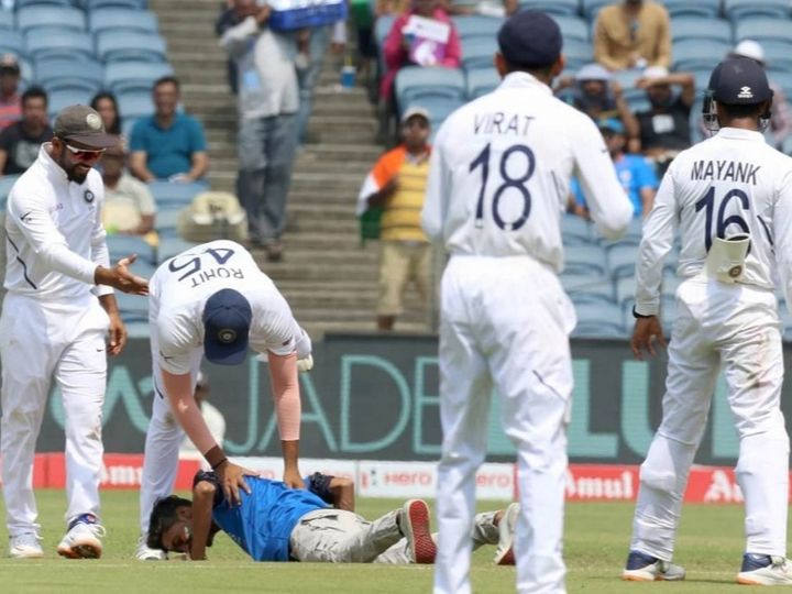 ind vs sa 2nd test fan breaches security enters field to touch rohit sharmas feet IND vs SA, 2nd Test: Fan Breaches Security, Enters Field To Touch Rohit Sharma's Feet